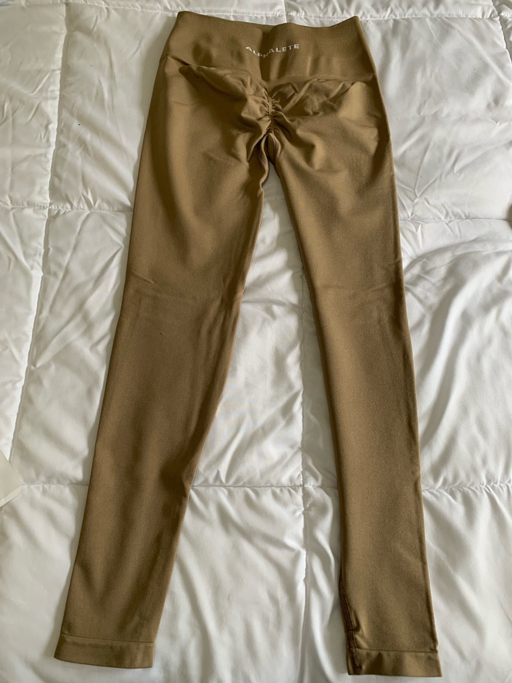 New in package ALPHALETE leggings size M